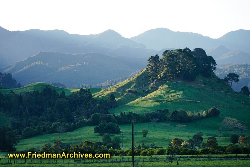 green,mountains,grazing,rolling,hills,mountains,trees,landscape,